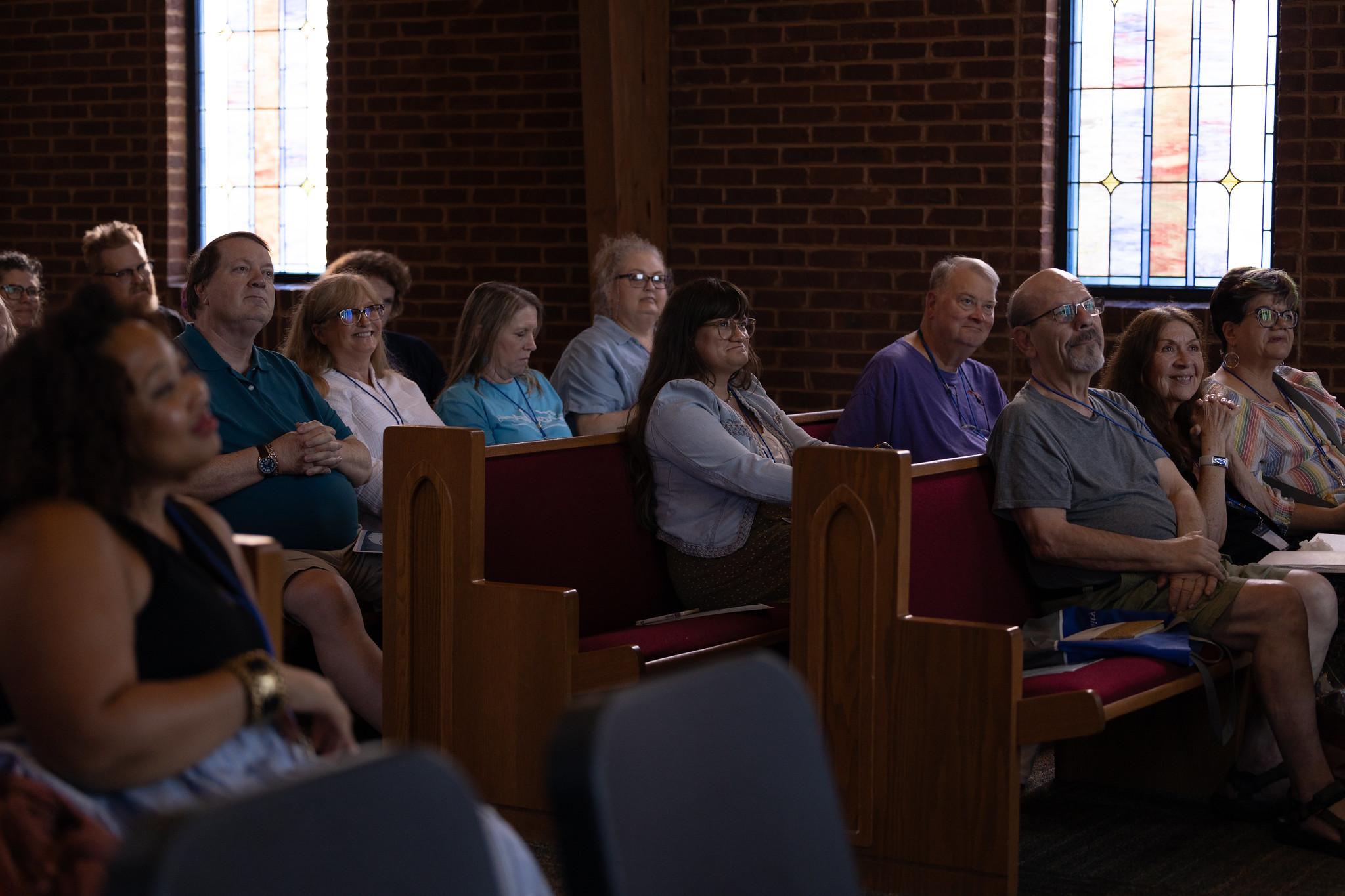 MHLF attendees listening to a speaker